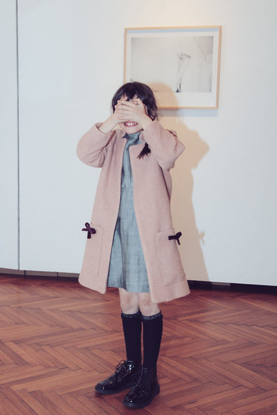 Wool coat with bows details
