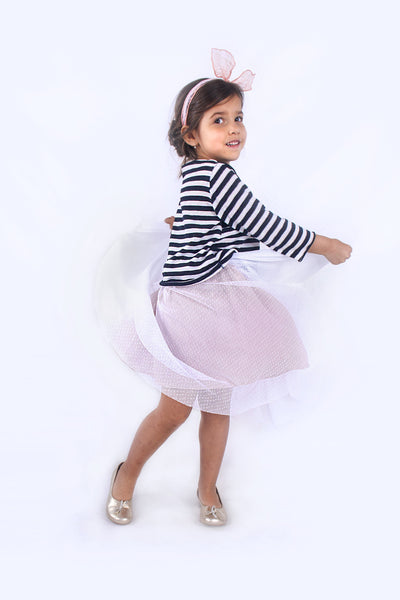 White skirt with pink petticoat