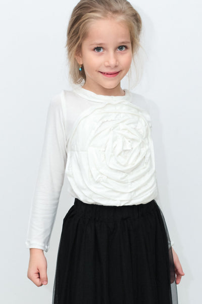 White top with flower detail
