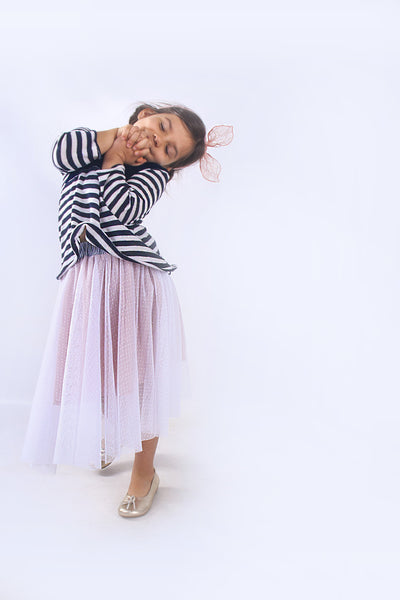 White skirt with pink petticoat